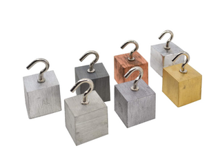 Blokjes van gelijke volumes en verschillende gewichten