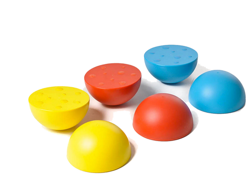 Halve bollen gevuld met zand Halve bollen gevuld met zand